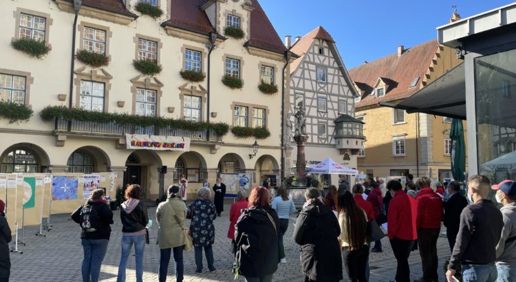 Interreligiöses Gebet und Vernissage der Banneraktion am Tag des Flüchtlings